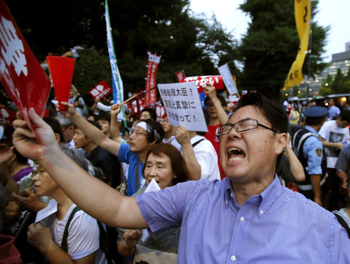 Japan opposition parties, citizens rally against gov’t move to ease arms export rules