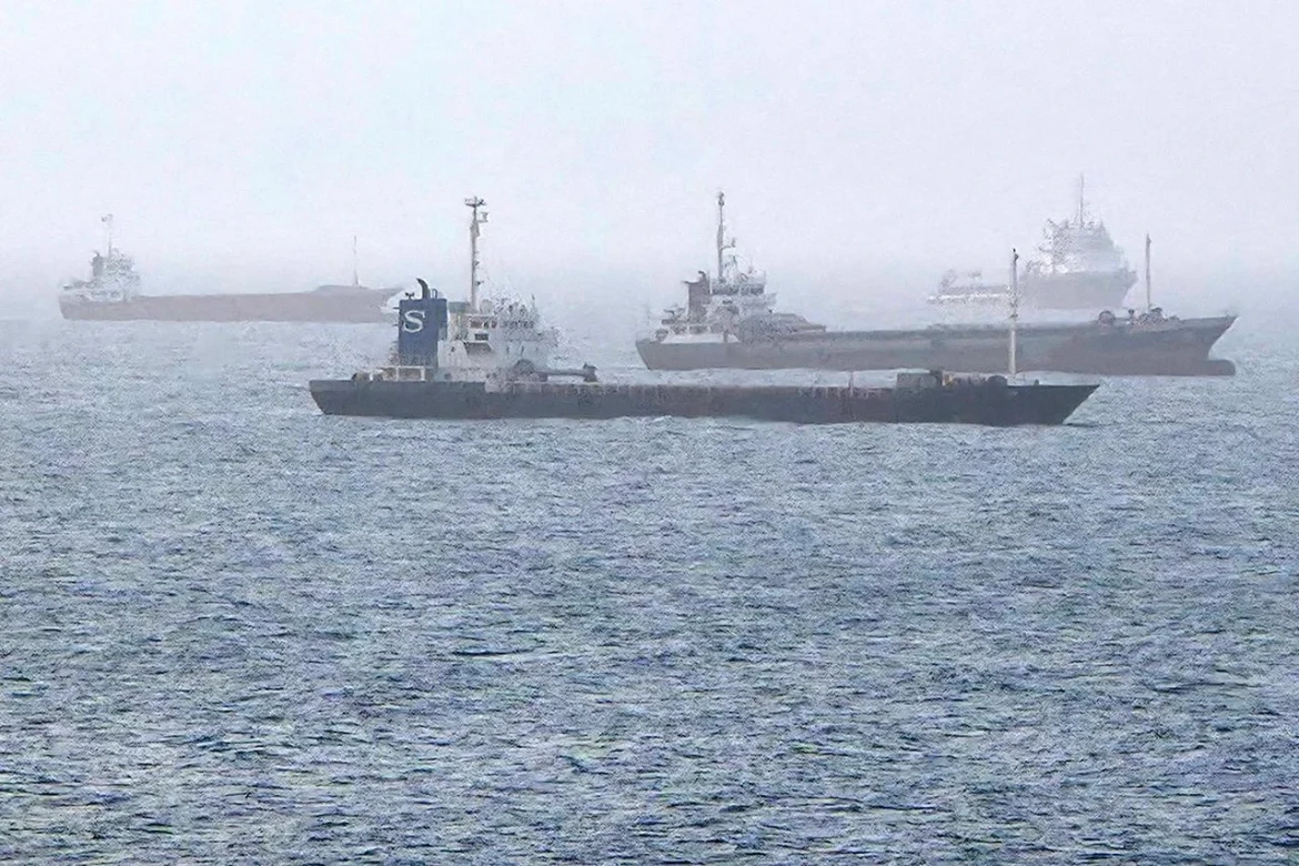 Iran warns ships accepting compensation from its frozen assets will be barred from transiting Hormuz