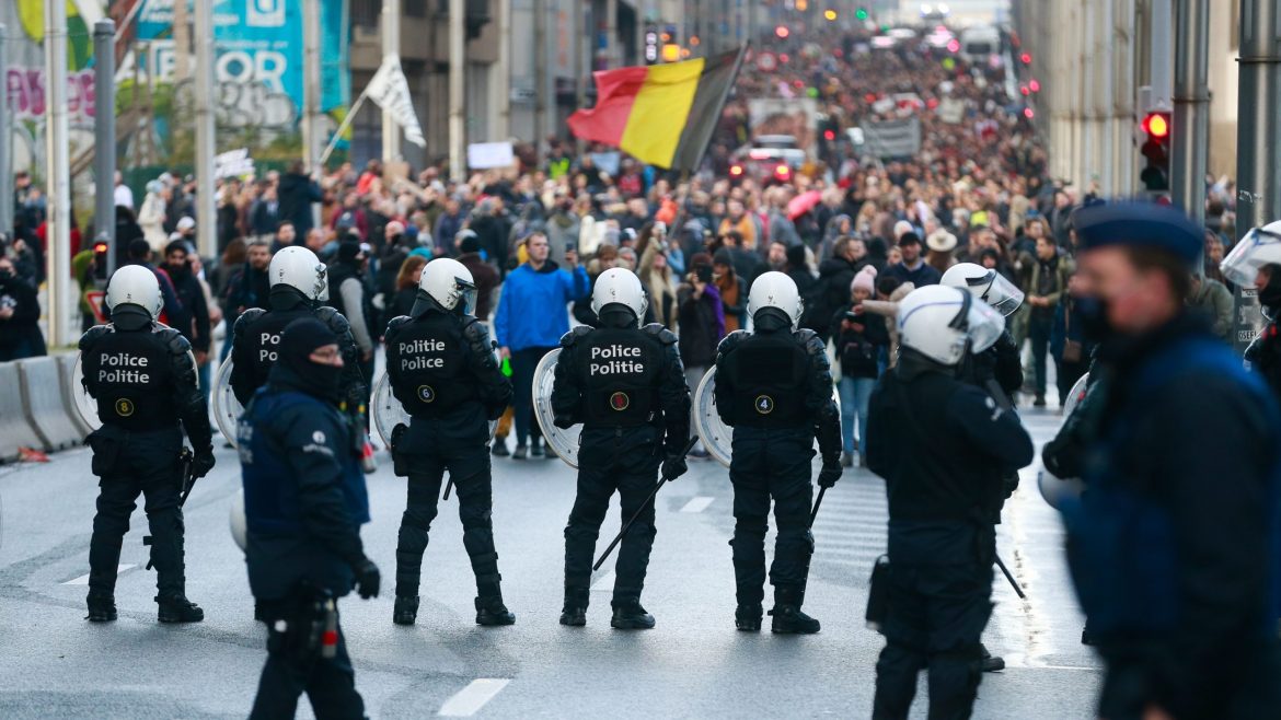 Thousands of people protest in Brussels against new coronavirus restrictions