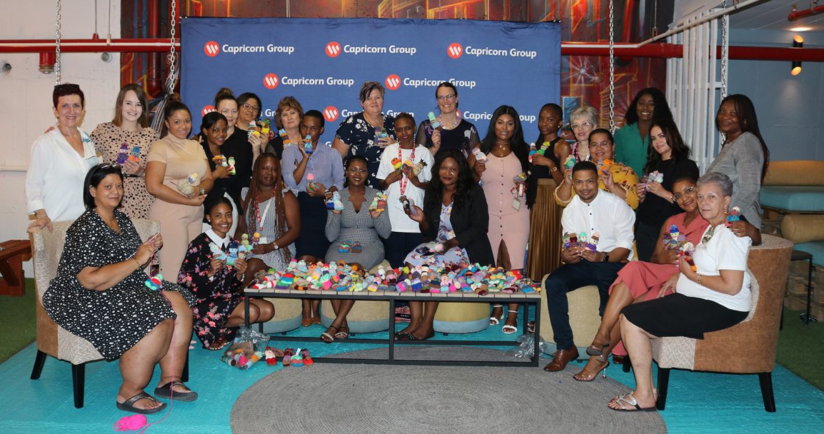 Capricorn Group Employees Donate Knitted educational dolls to the Amos Meerkat Syllabus project.